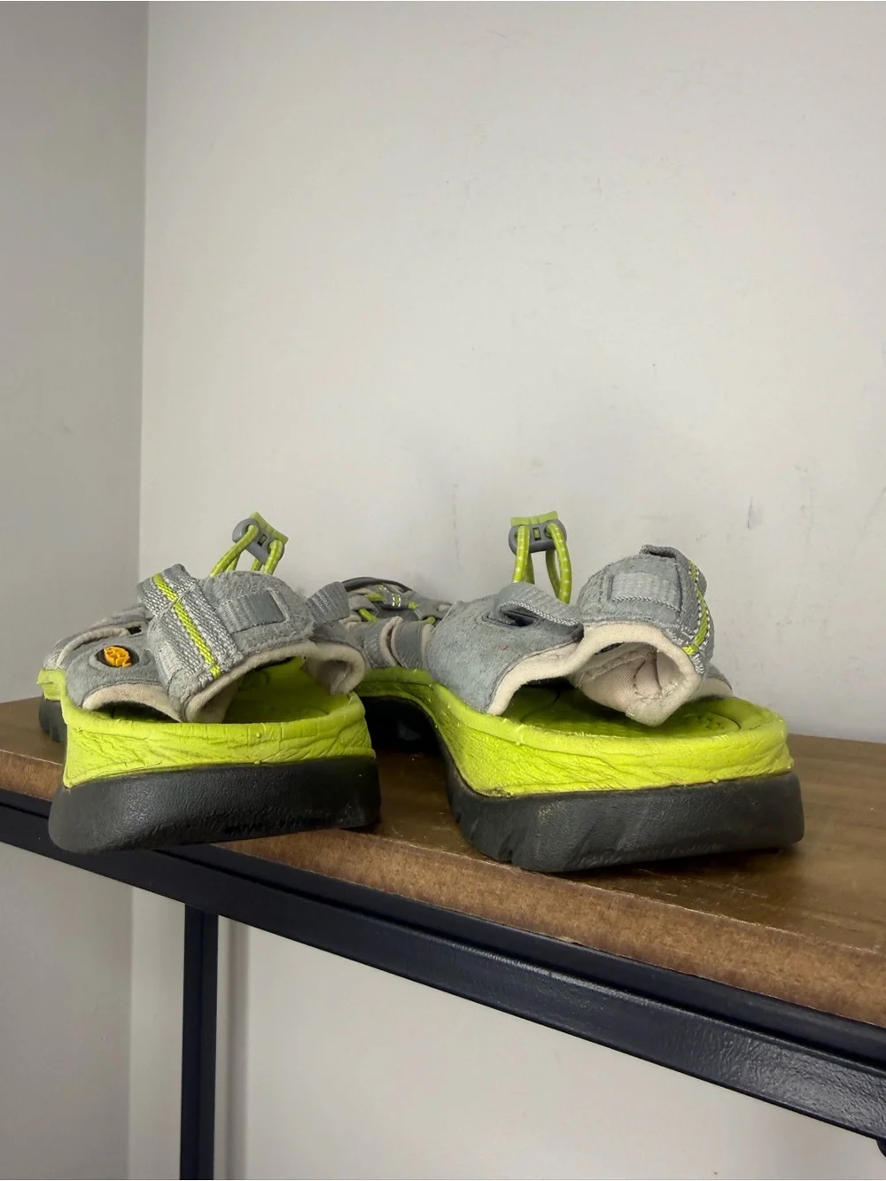 women's Keen Whisper sandals in a neutral gray and bright green colorway